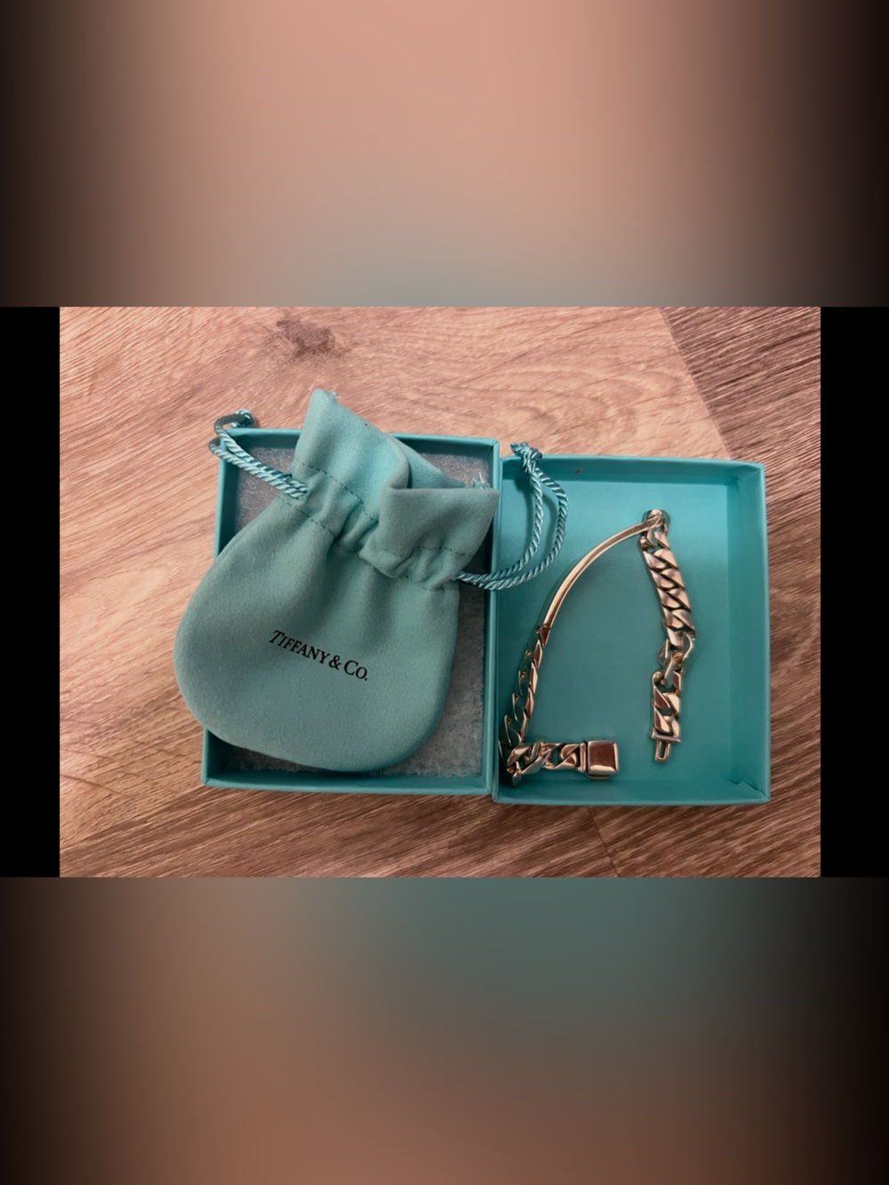 Tiffany & Co. Silver Curb Chain Bracelet with Curved Bar